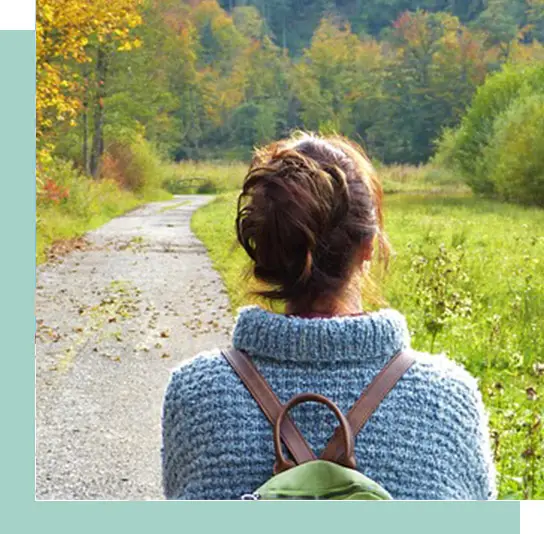 Calm woman walking after anxiety therapy, symbolizing confidence and emotional freedom.